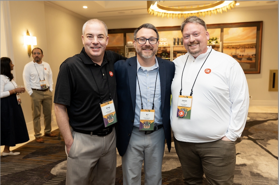 Employees Greg Clements, AJ Selvey, and Jason Sole enjoy time together at DEAMcon24