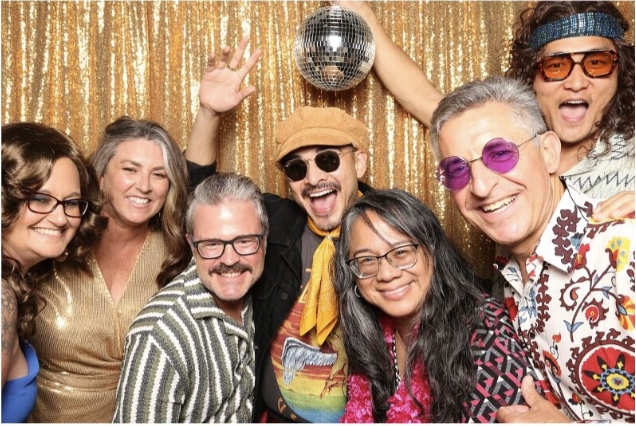 Exec office team photo booth 1975.png
