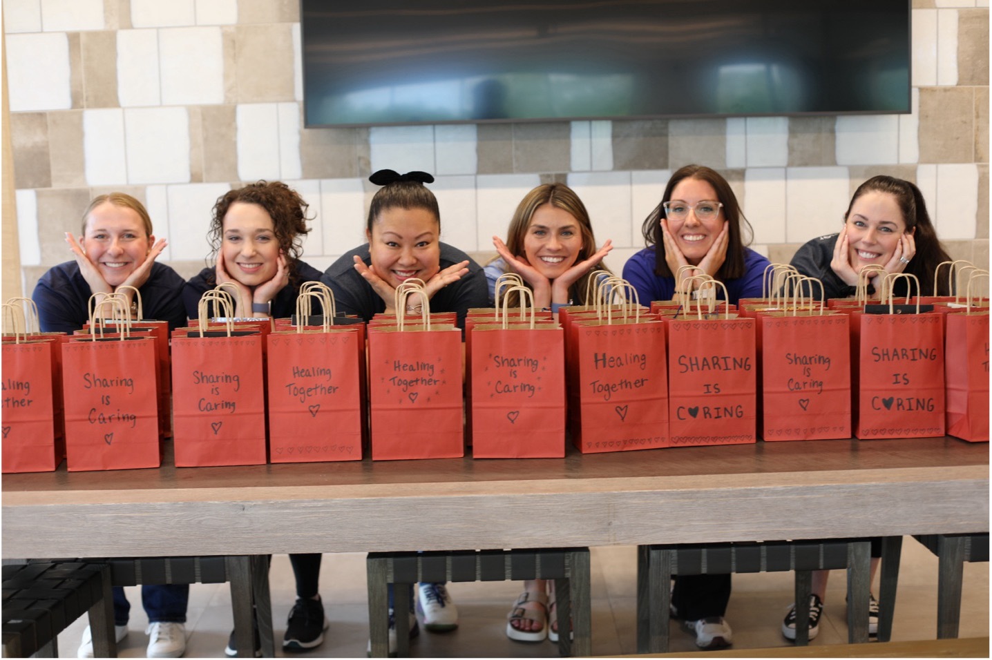 First American colleagues assembled care bags during Impact Day for children who recently lost a parent or sibling.