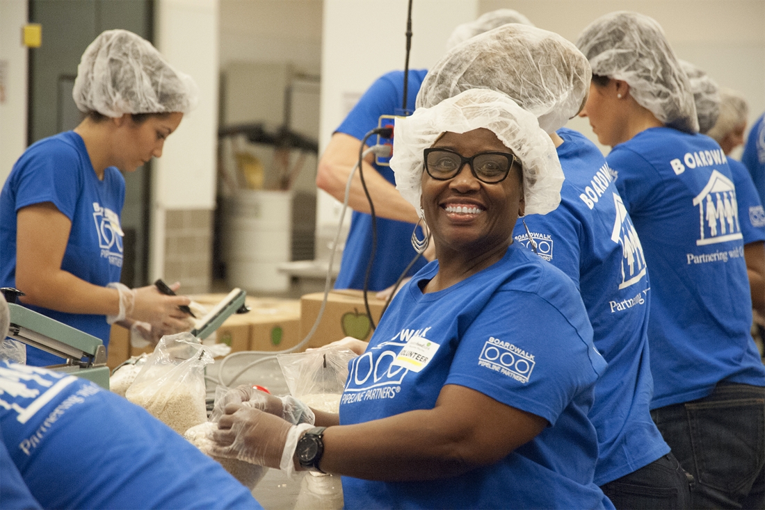 Boardwalk Employees Volunteering at the Houston Food Bank (Image captured prior to COVID-19 pandemic)