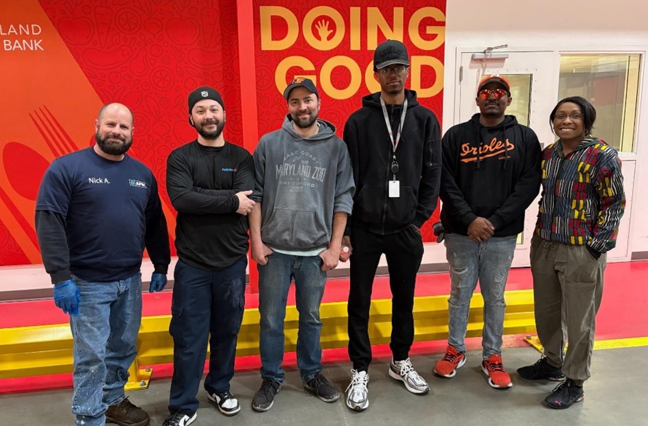 Team Members from all three divisions of Hamilton taking part in one of our yearly community service activities.jpg