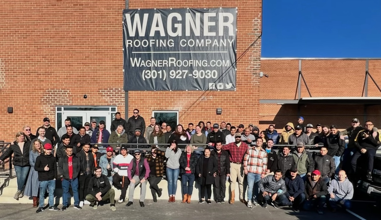 Nearly the full team outside of our new office, warehouse, and custom sheet metal fabrication facility.
