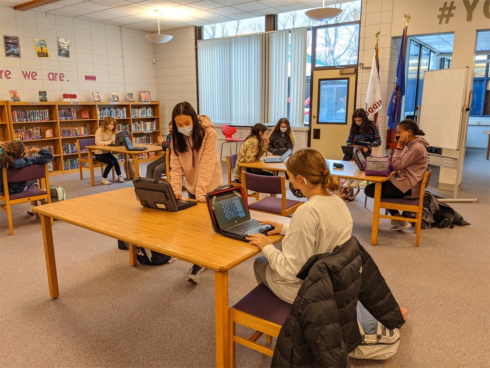 Bayside Middle School Chess Club student playing socially distanced chess