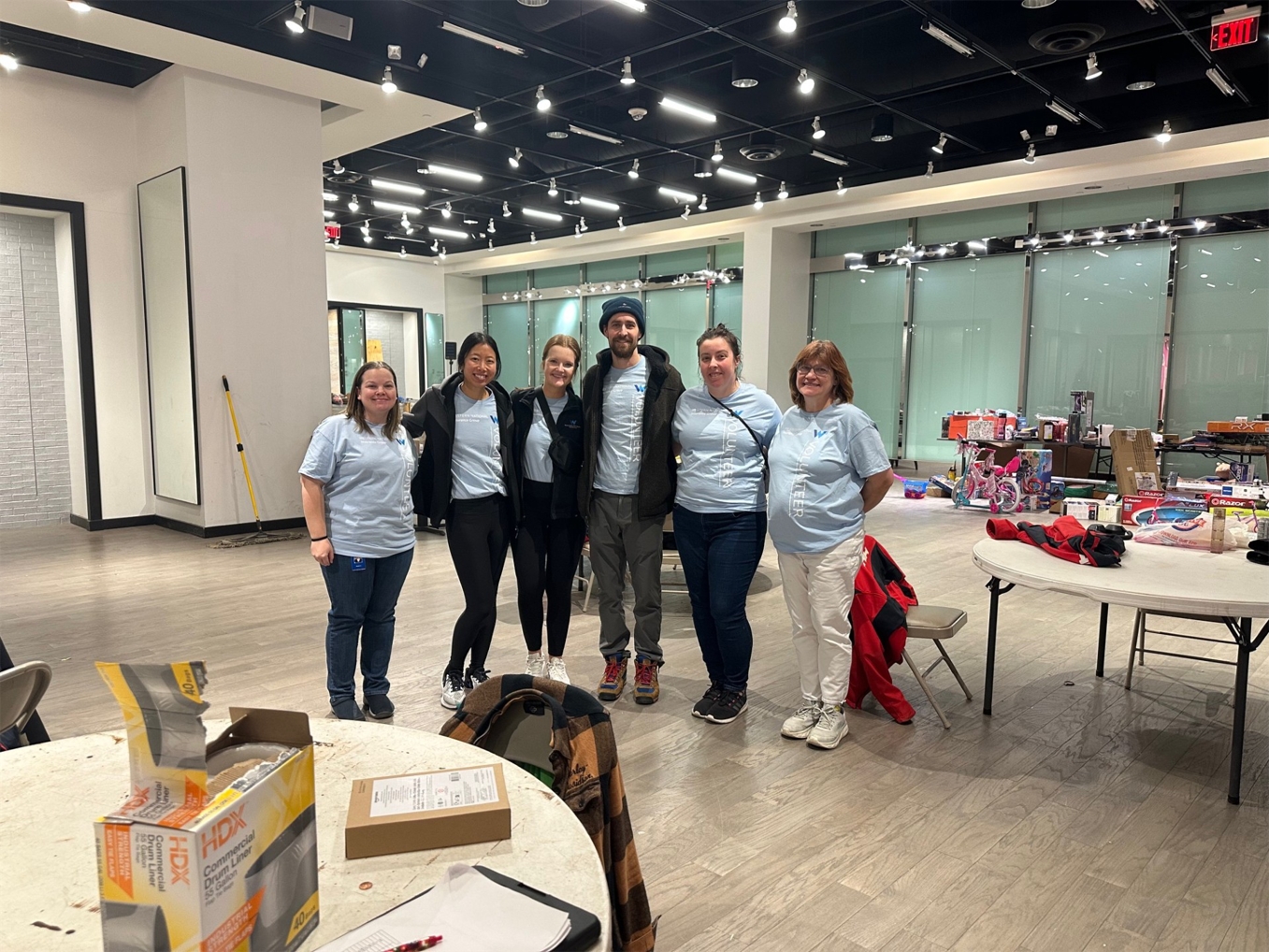 Western National Employees volunteering to sort toys at Toys for Tots.