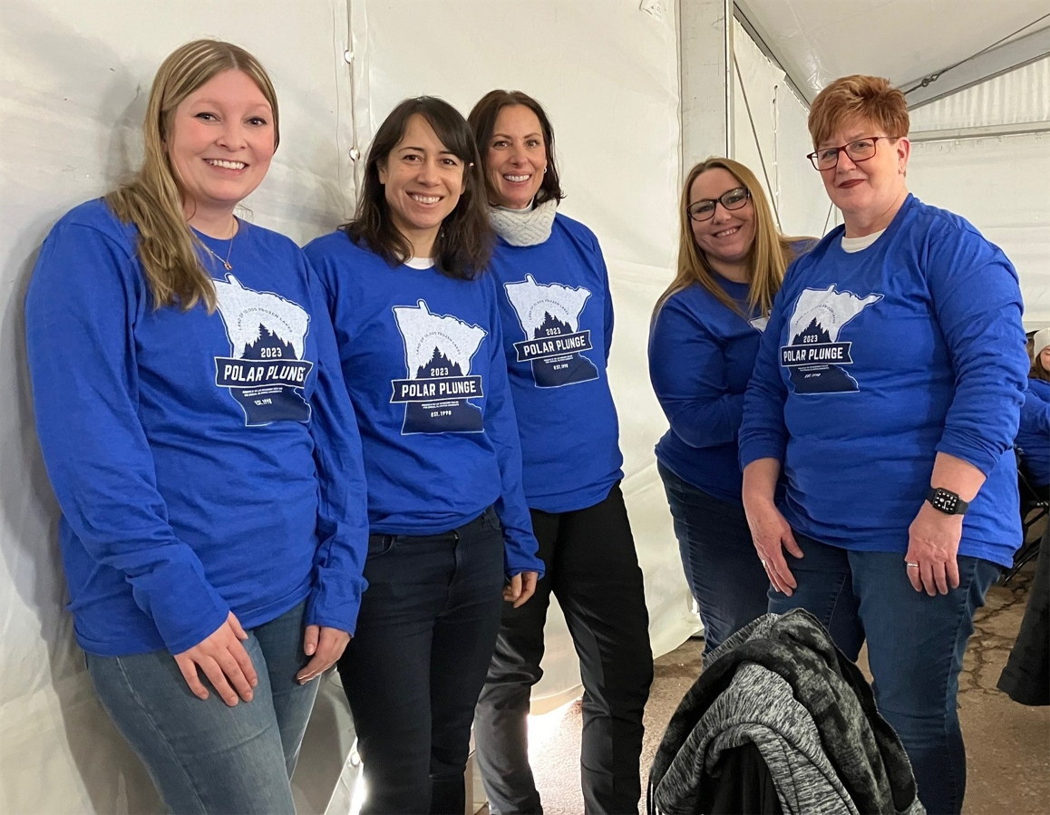 A group of Western National volunteers at the Polar Plunge event in  March, where they helped check in and register attendees.