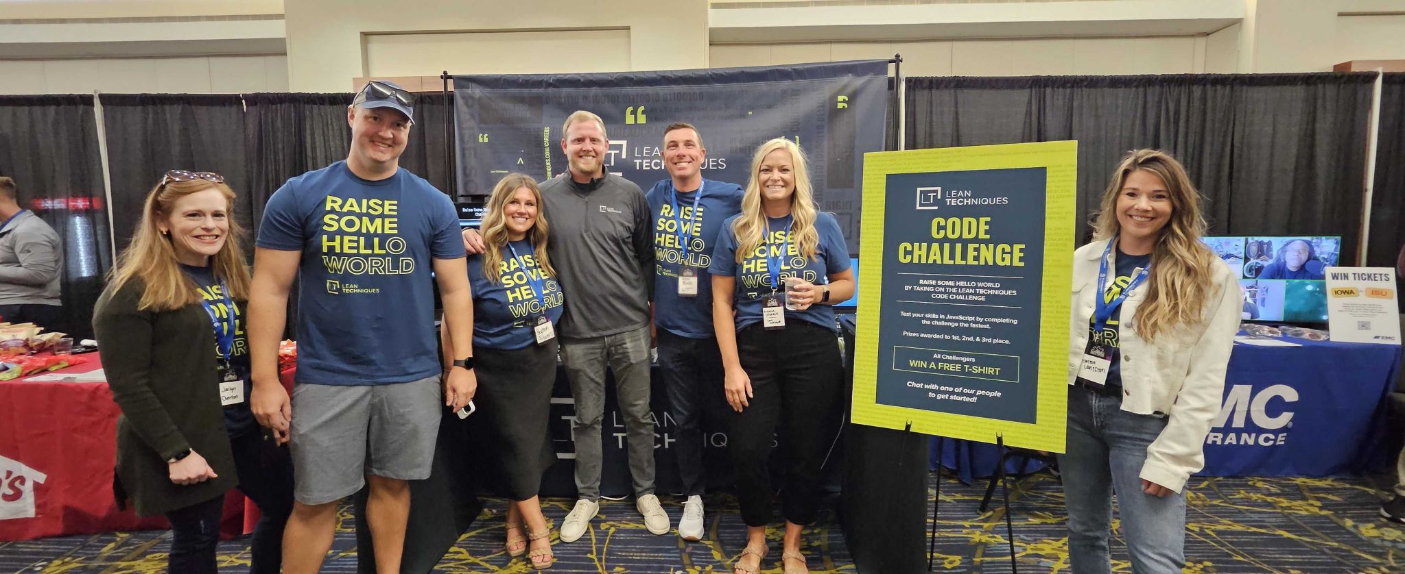 LT team members stopping by the Lean TECHniques booth at a technology conference in Des Moines.