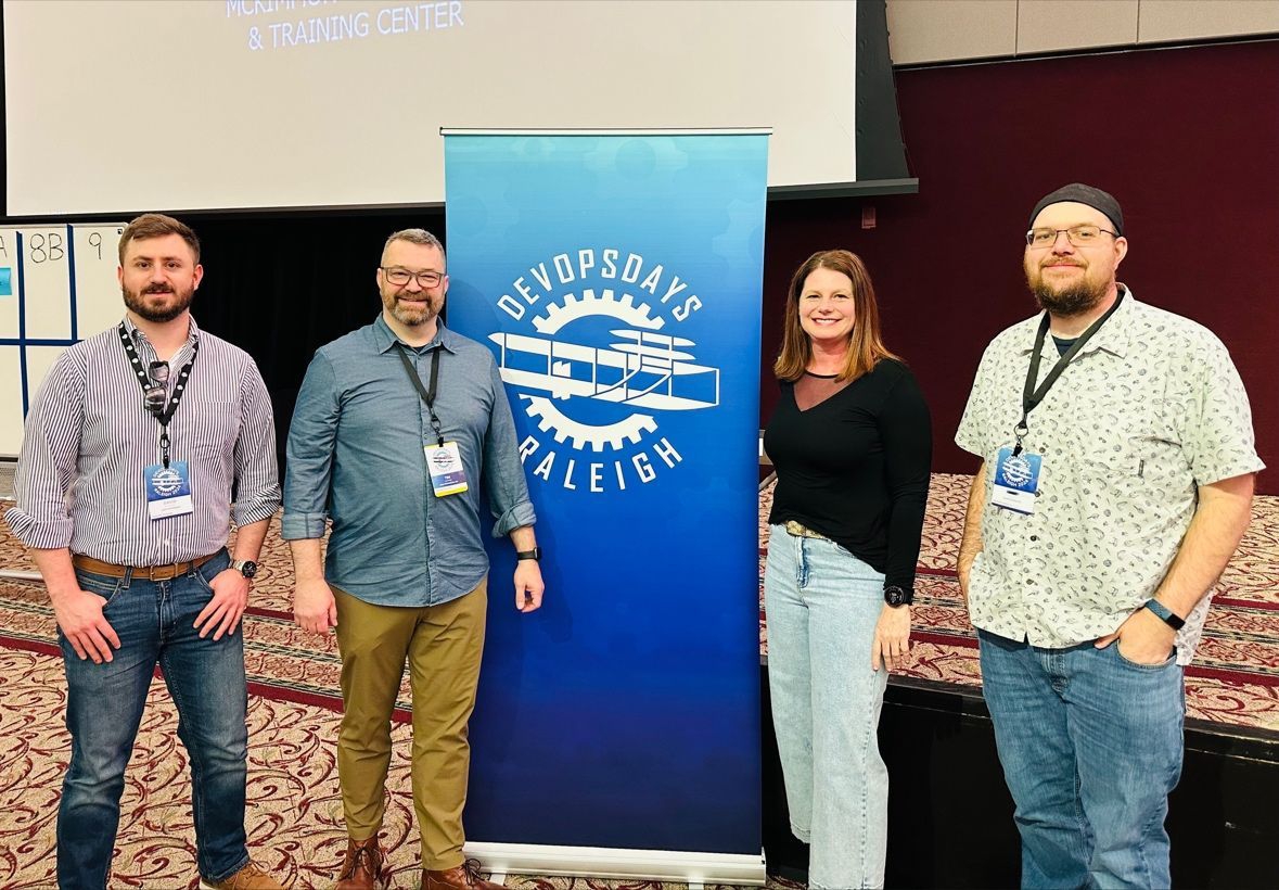 LT team members regularly attend and present at conferences nationally. This is a group at the DevOps Days Raleigh Conference.