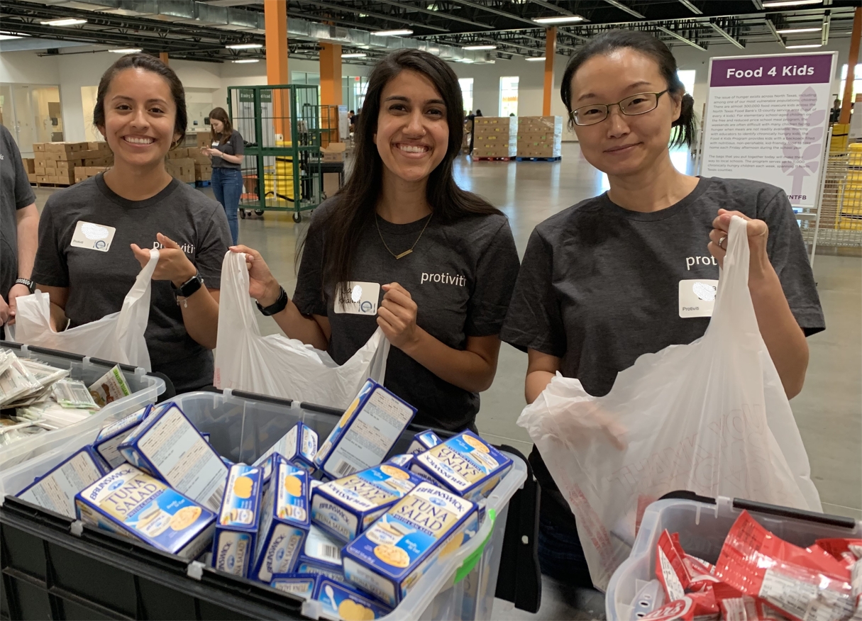 Protiviti Employees Pack Meals as Part of the Firm’s i on Hunger Community Service Initiative