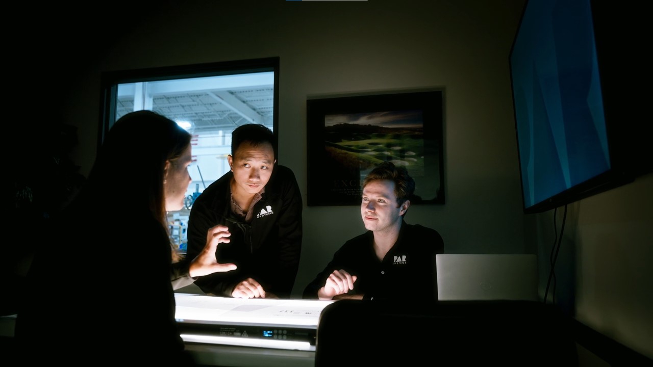Engineers Collaborating at PAR Systems