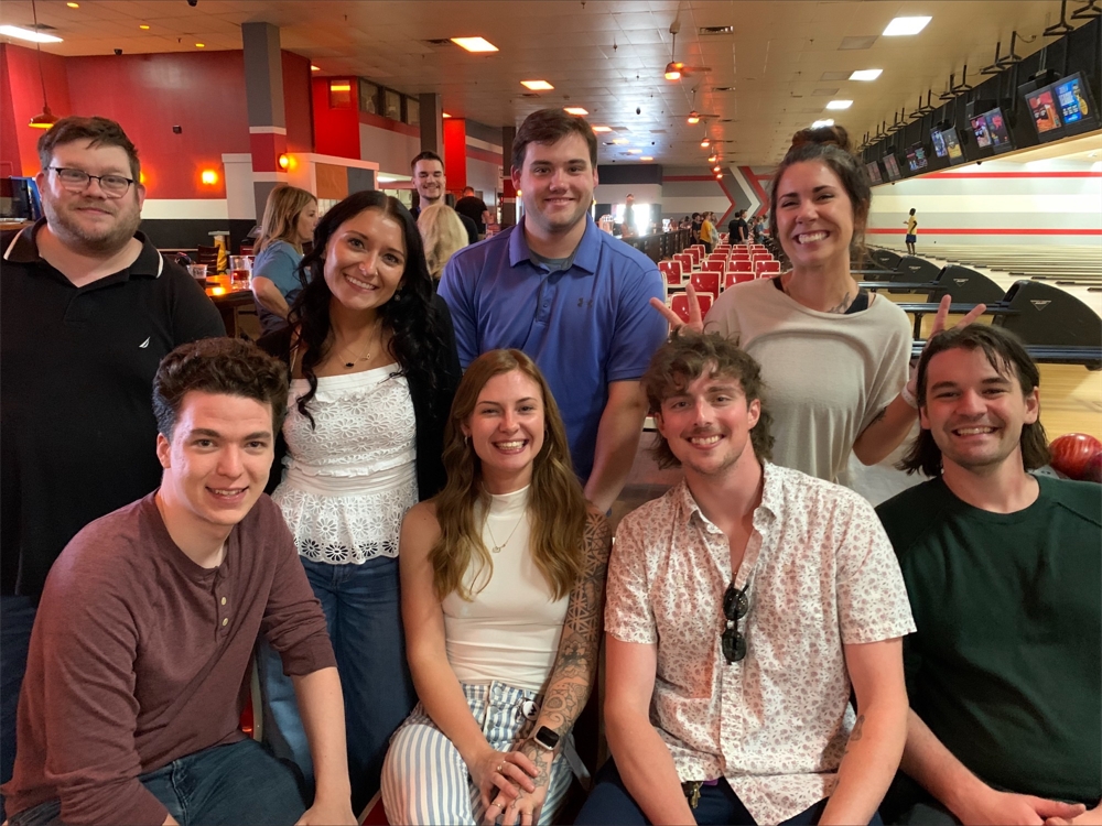 Western National employees enjoying a Social Committee outing at a bowling alley!