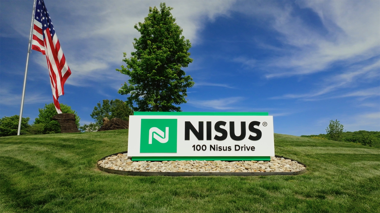 The sign at the entry of Nisus Corporation.