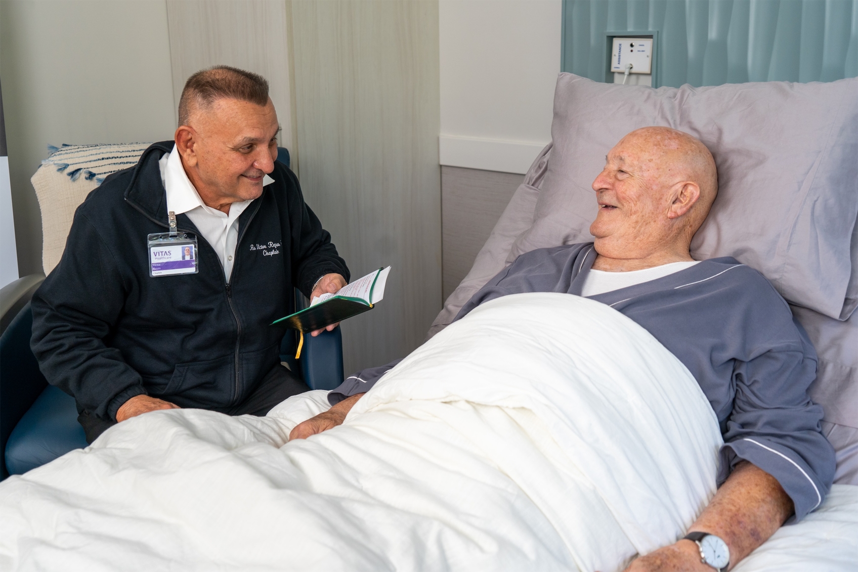 VITAS Healthcare Male chaplain and male patient.jpg