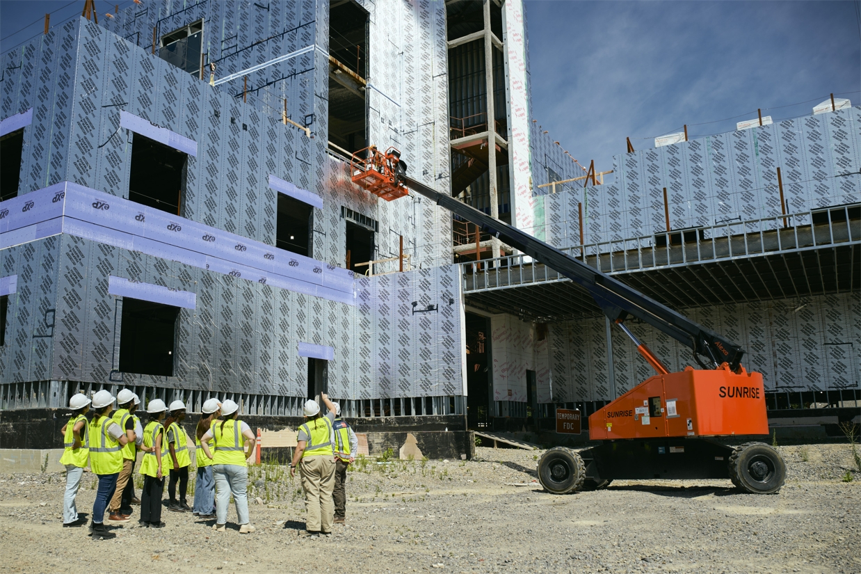 Student interns tour a hospital construction site during their summer with SmithGroup Boston.