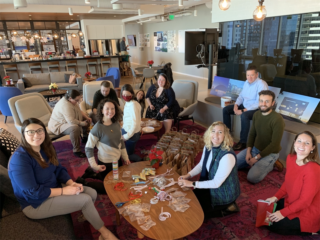 SmithGroup Boston colleagues enjoy catching up in the office commons