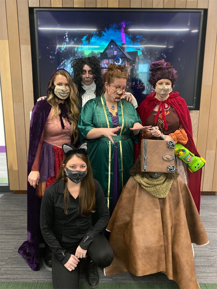 Employees dressed up for our annual Halloween costume contest.