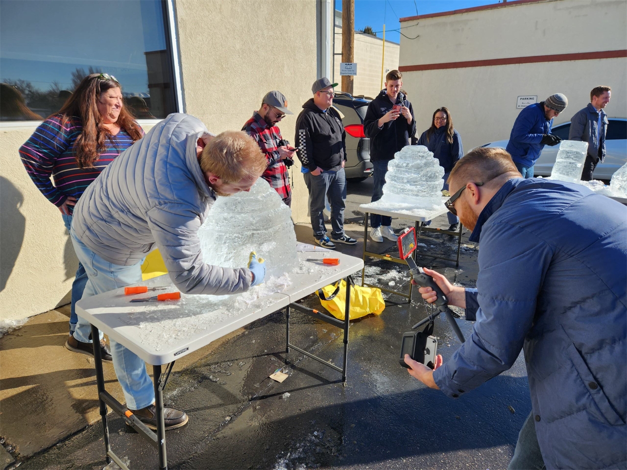 Making ice sculptures in the back parking lot