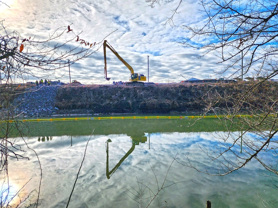 UCOR workers removed 200,000 pounds of transite material from the Poplar Creek bank that winds through ETTP.