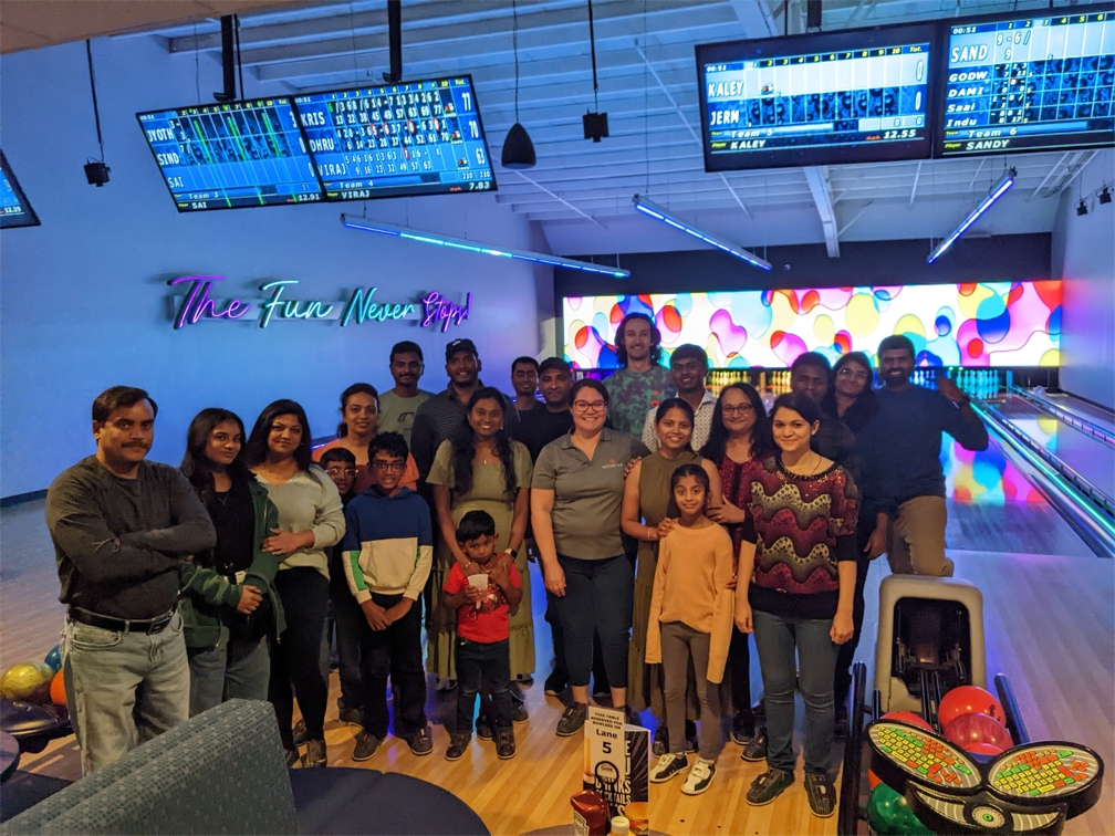 Altimetrians and their families enjoying an afternoon of bowling.