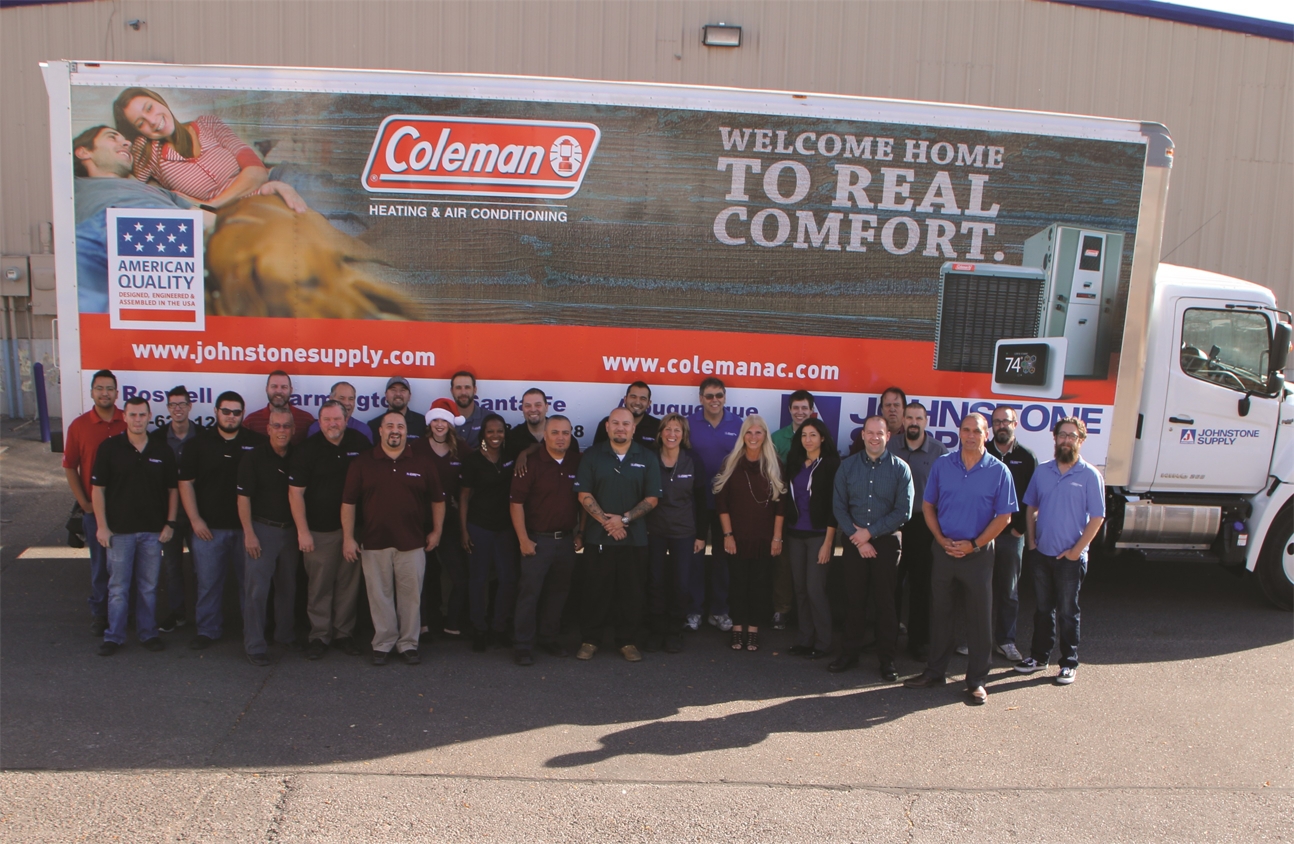 Staff in front of new Delivery Truck