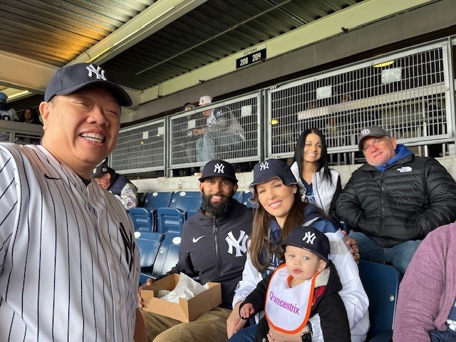 Team Members bonding with others at a NY Yankees game!