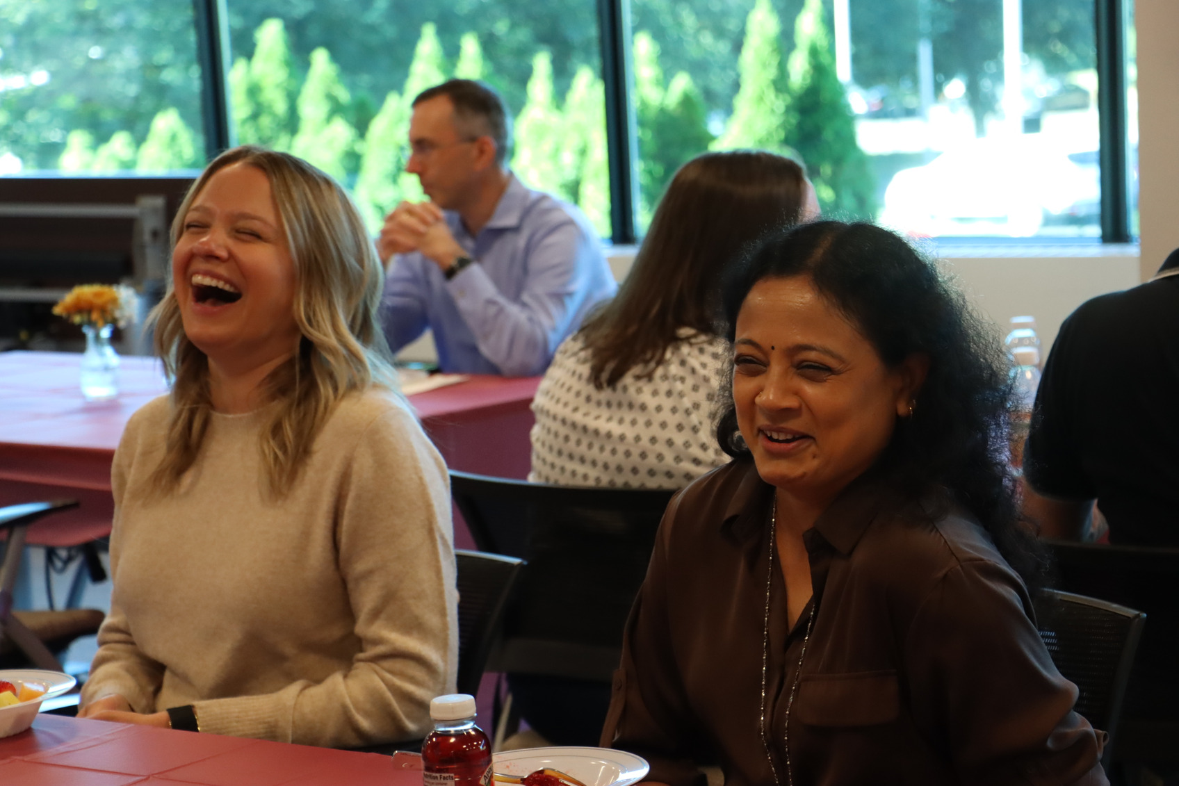 Members of the leadership team dine with Service Award recipients celebrating five-year milestones
