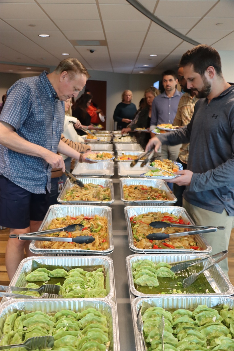 Employees enjoy a special lunch celebrating Asian American and Pacific Islander Heritage Month