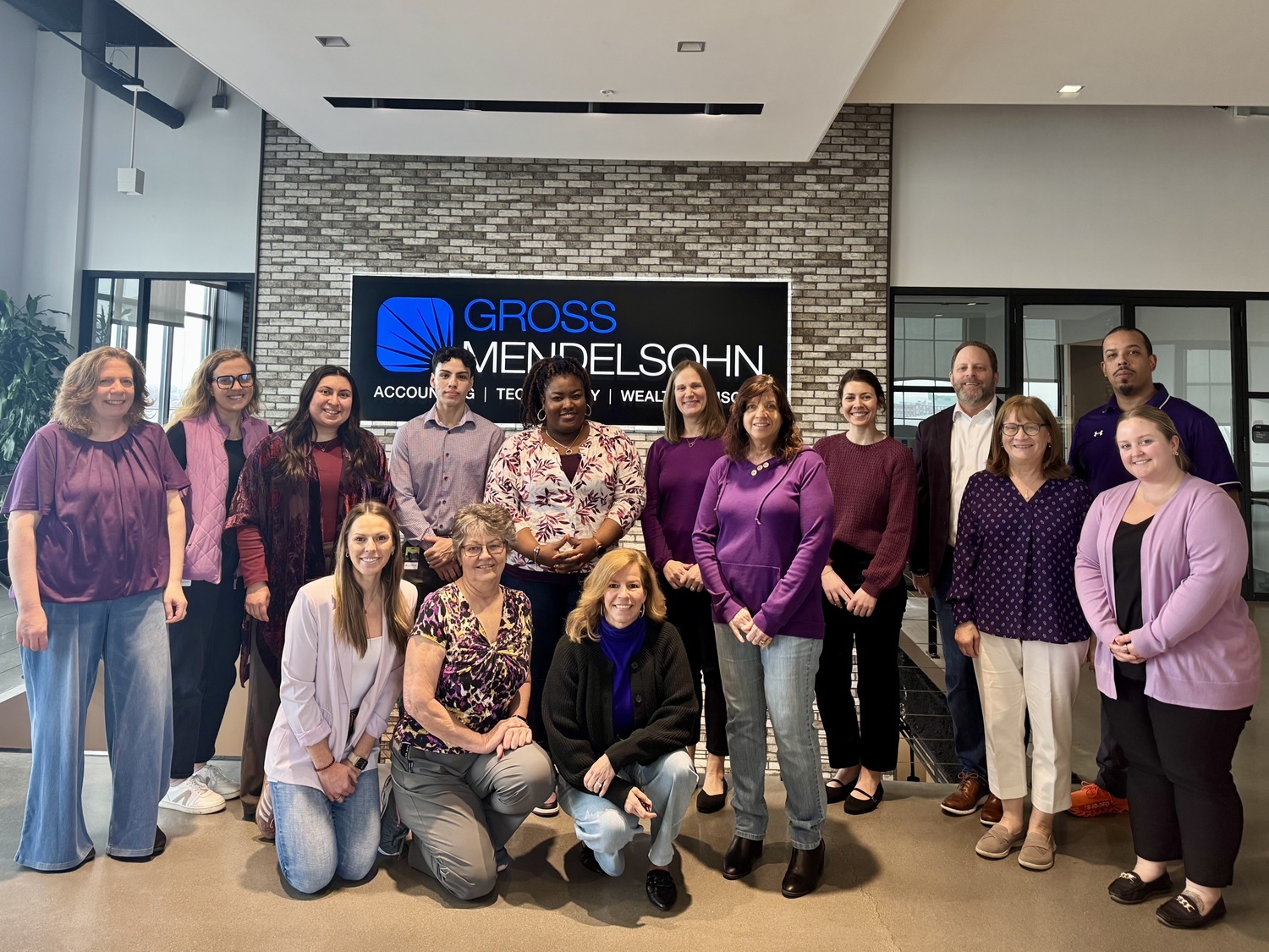 Gross Mendelsohn staff wearing purple in honor of Women's History Month.