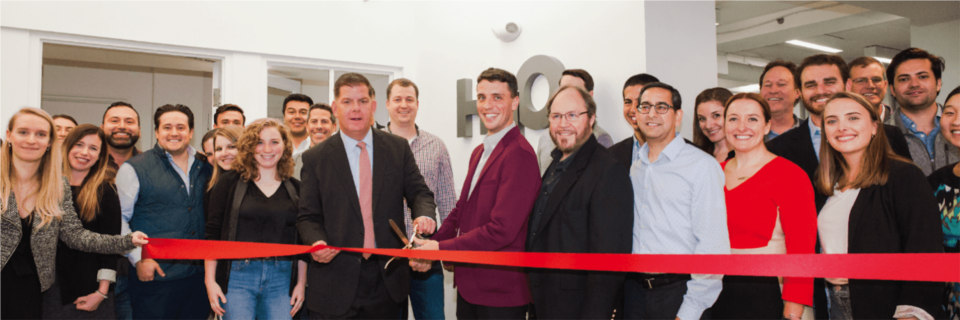 Mayor Martin J. Walsh cutting the ribbon at HqO's new office opening in Downtown Crossing.