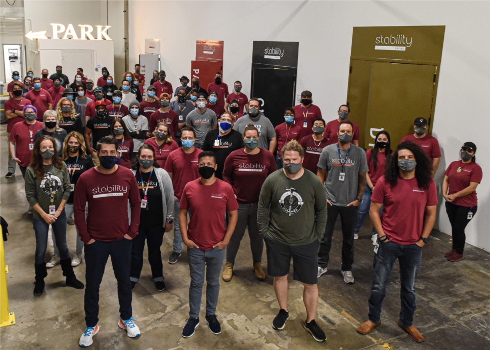 Stability Cannabis team members inside their state of the art cultivation facility.