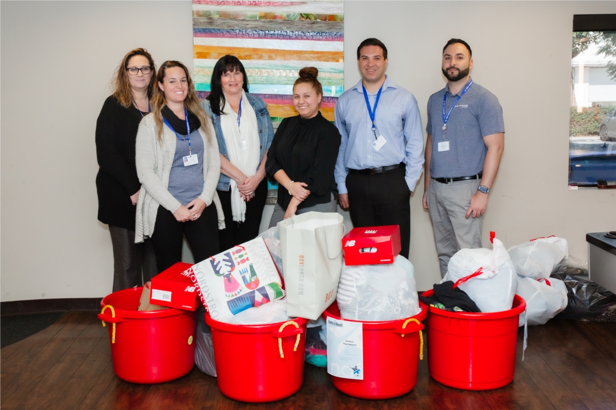 New American Funding employees at corporate headquarters collecting items for clothing drive 