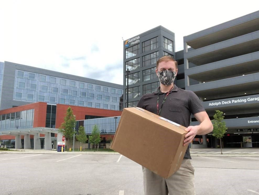 Mike Singer delivering Face Shields to Summa Health Systems