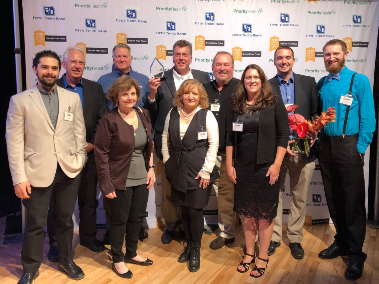 RL Deppmann employees with Top Workplaces Award 