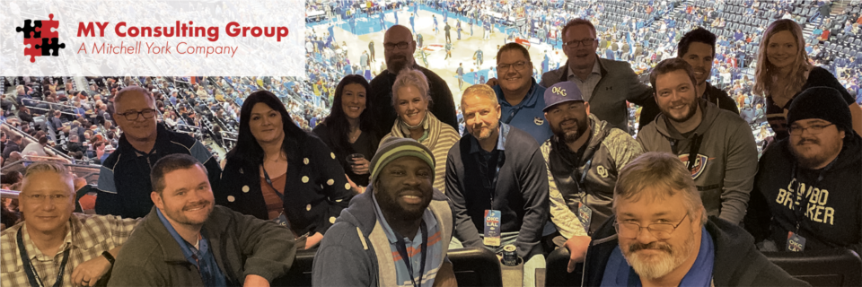 The MY Consulting Group team enjoying a Thunder game