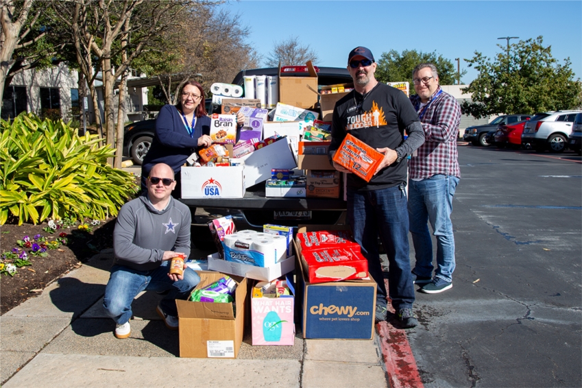 Team members preparing to deliver collected donations to Williamson County Brown Santa.