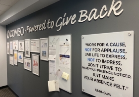 The Powered To Give Back wall bears testimony to COMSO's ongoing support of our community through many charitable organizations.