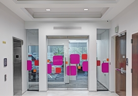 Clearview Group's main lobby with notes of our vibrant tri-color logo.