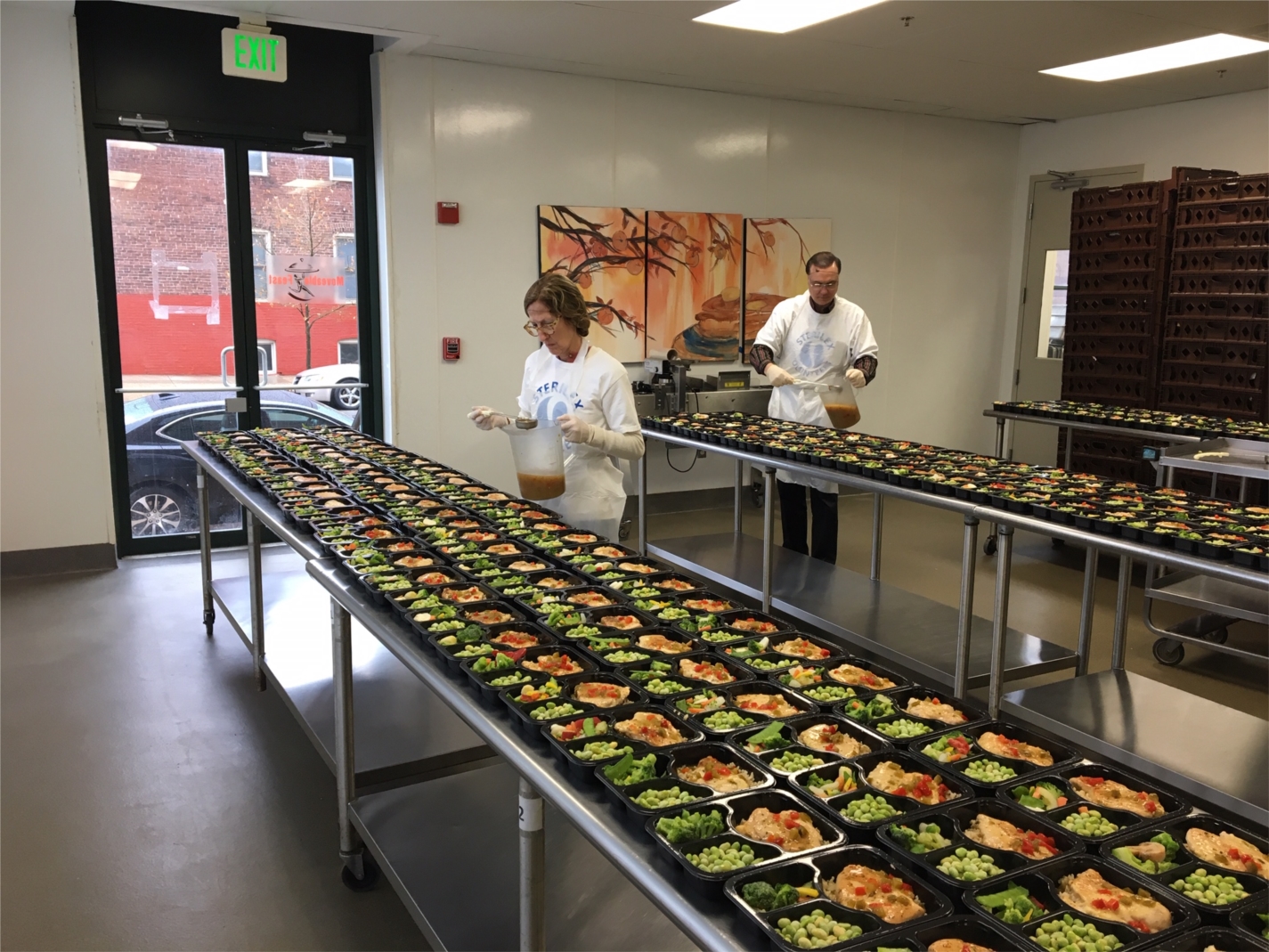 Our Sr. Director of Operations and our VP of R&D volunteering at moveable feast.  along with several other team members we plated over 400 mels for local families in need.