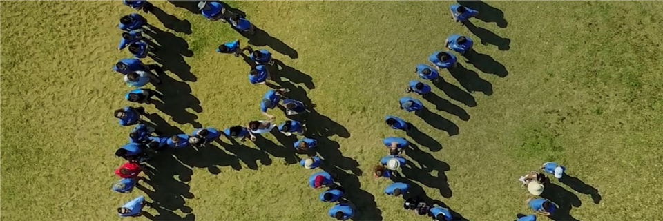 Team picture from when we could get together, we made our logo with team members and someone's drone. 