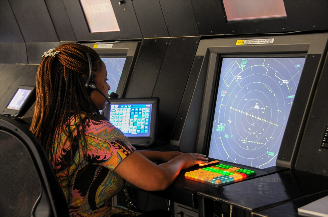 An Air Traffic Control student receiving instruction in a radar lab at the FAA Academy in Oklahoma City, OK.  