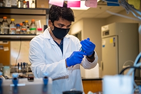 Staff Scientist, Shylesh Bhaskaran works his magic in an OMRF Aging & Metabolism Research Program laboratory.