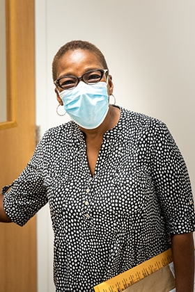 "Can you see my smile underneath this mask?" Fredonna Carthen, Clinical Trial Project Administrator, still smiling after over 23 years at OMRF. 