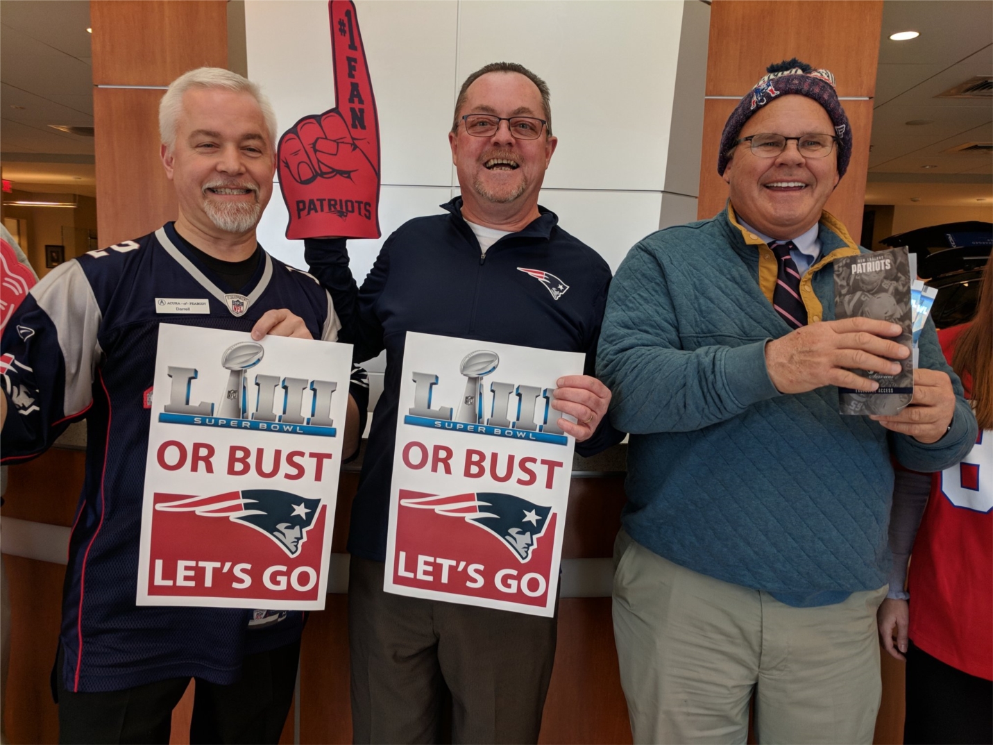 Lyon Waugh Fixed Ops Director, Darrell Glass and Acura of Peabody General Manager are given Superbowl tickets from Managing Partner, Warren Waugh, for a job well done! 