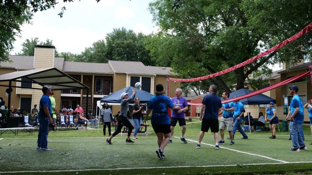 Company volleyball tournament hosted at Saint Croix Apartments