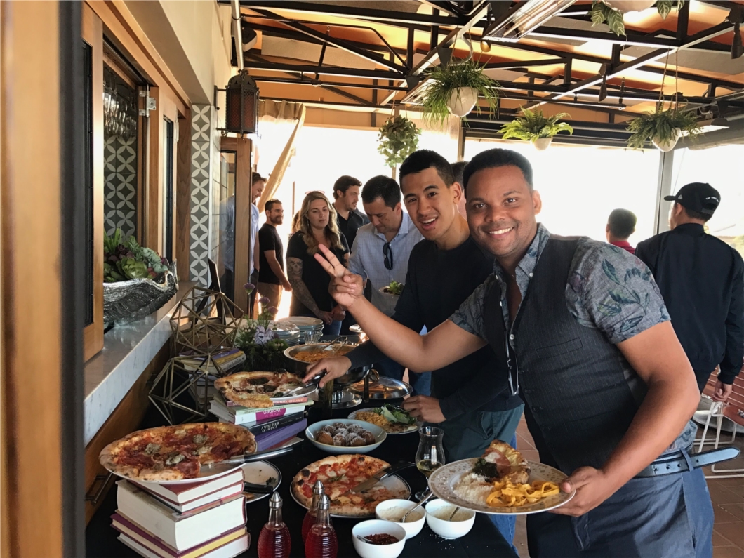 Employees enjoying a summer party at Catania in La Jolla 