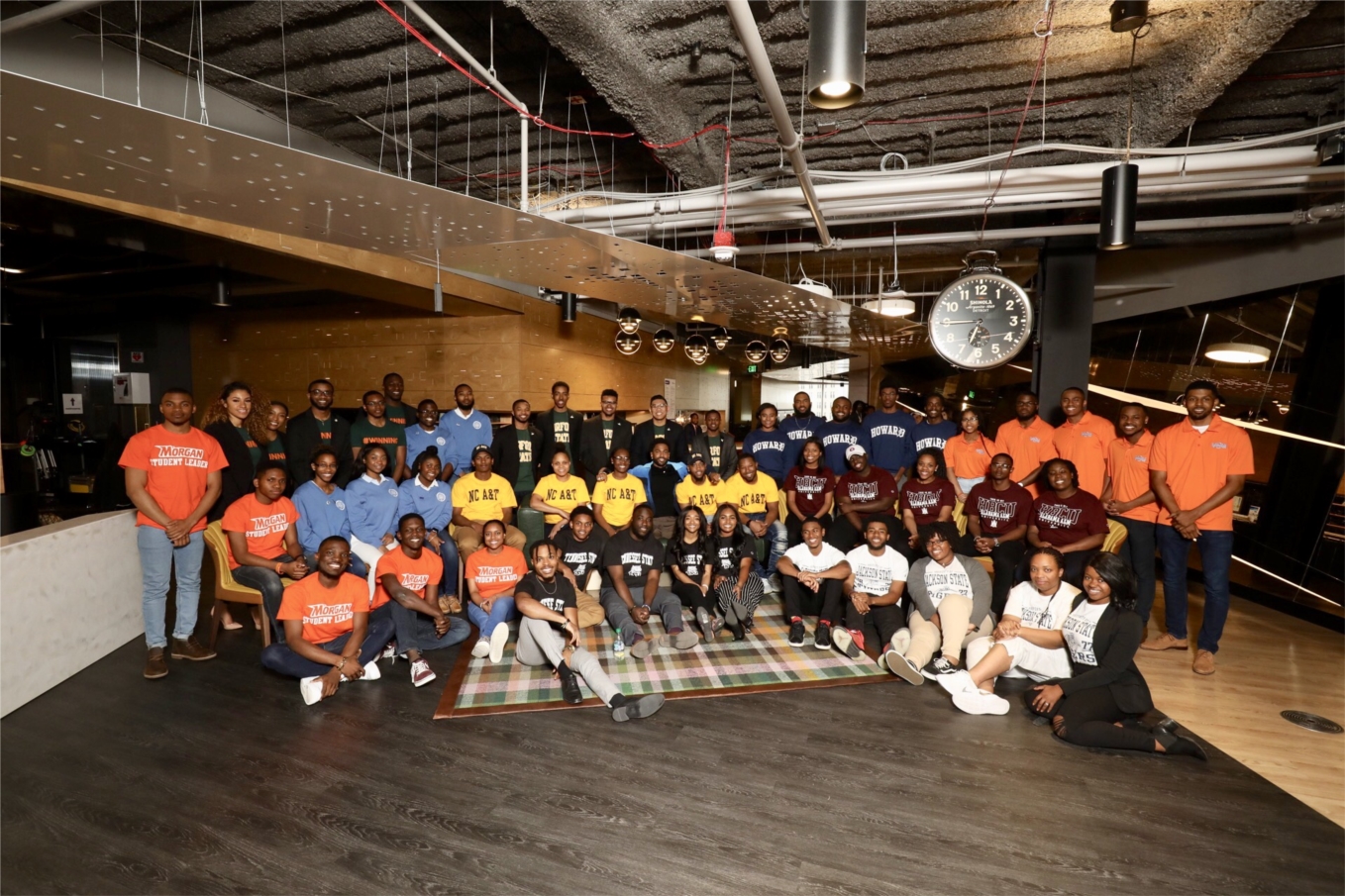 The fifty student participants in Moguls in the Making pose with Sean “Big Sean” Anderson (center) on Sunday, March 31, 2019. The students work in ten teams of 5 to develop business plans that include solutions to economic issues facing various industries in Detroit and pitch their ideas to a panel of judges including Anderson