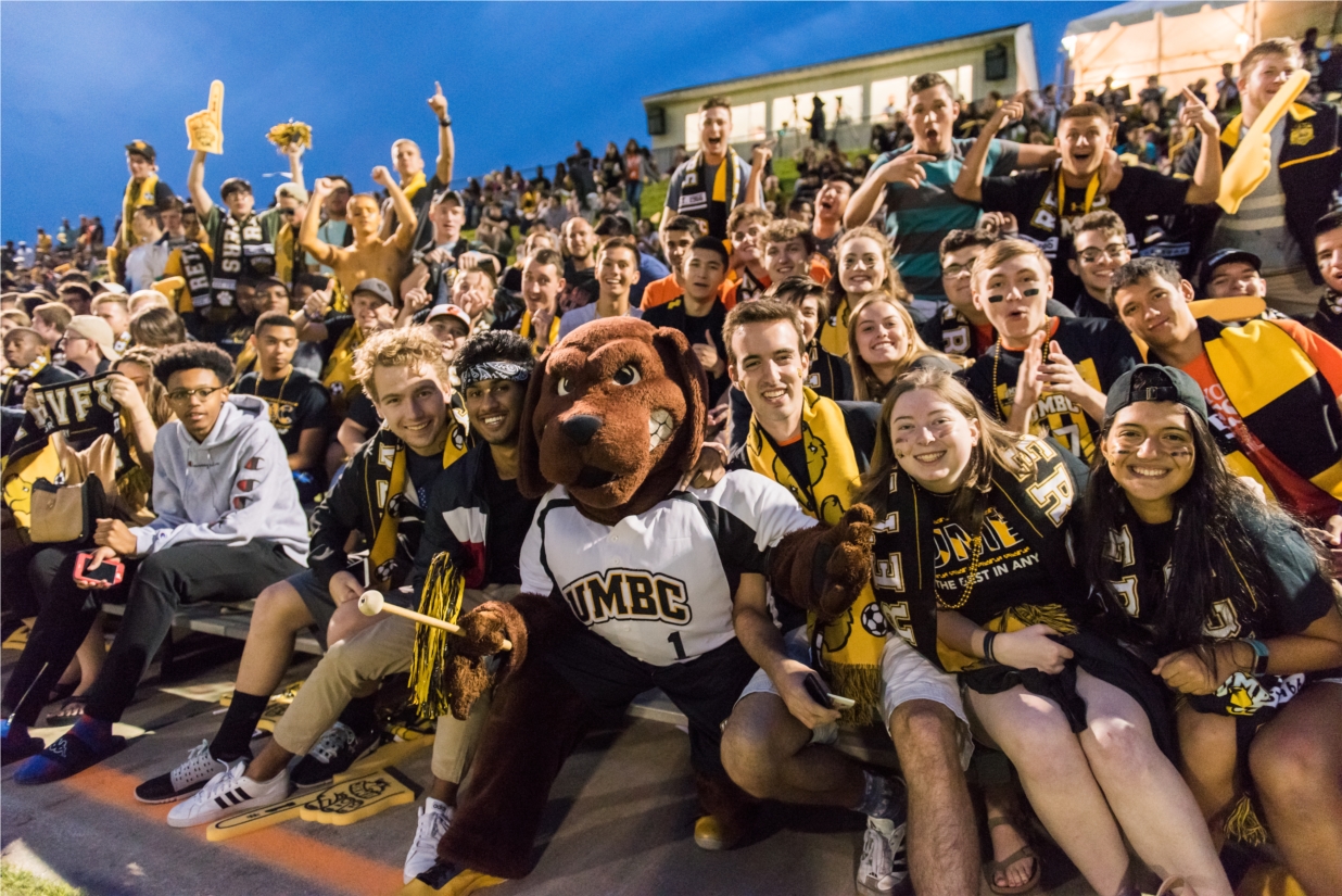 UMBC's mascot, True Grit, joins fans to cheer on the men's soccer team.