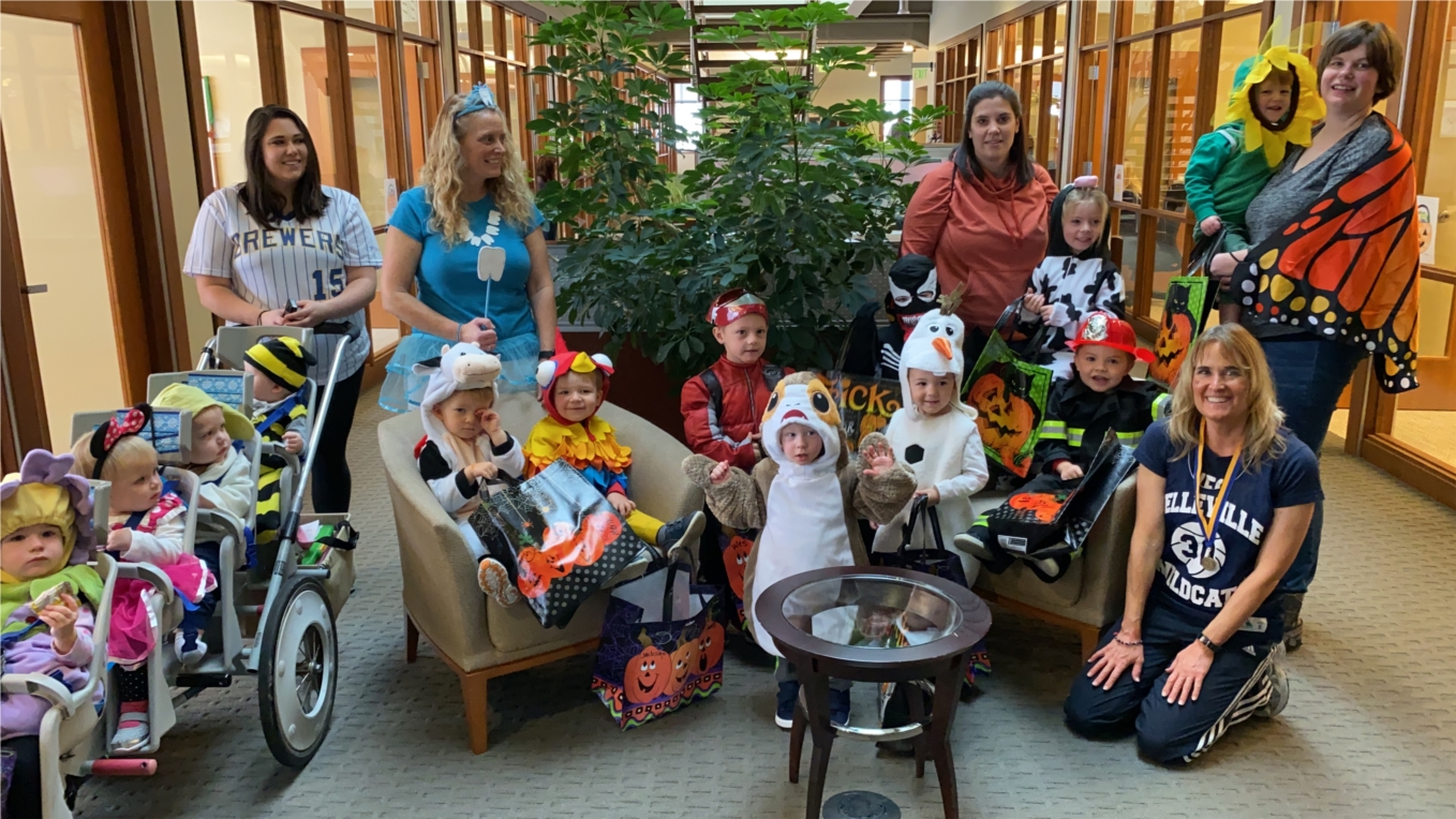 Trick or Treating at our Madison office with the kids from Little Builders Daycare