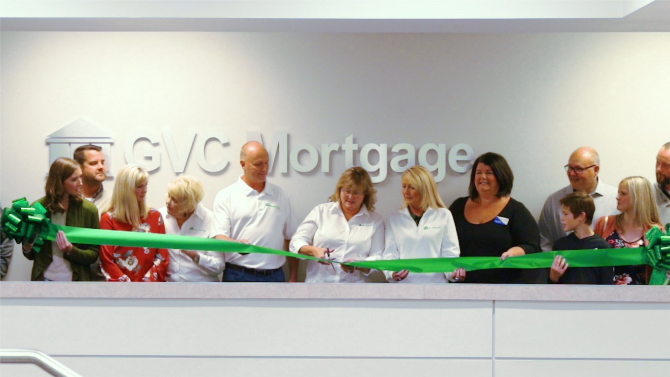 Ribbon cutting at the grand opening of GVC Mortgage, Inc,'s new corporate office location
