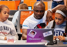 One of our tech leads works with some of our young students during our annual TechGirlz workshop. This year we focused on the value of storytelling through data utilizing different data visualization tools. Our volunteers worked with 25 girls during our hands-on full-day workshop. 