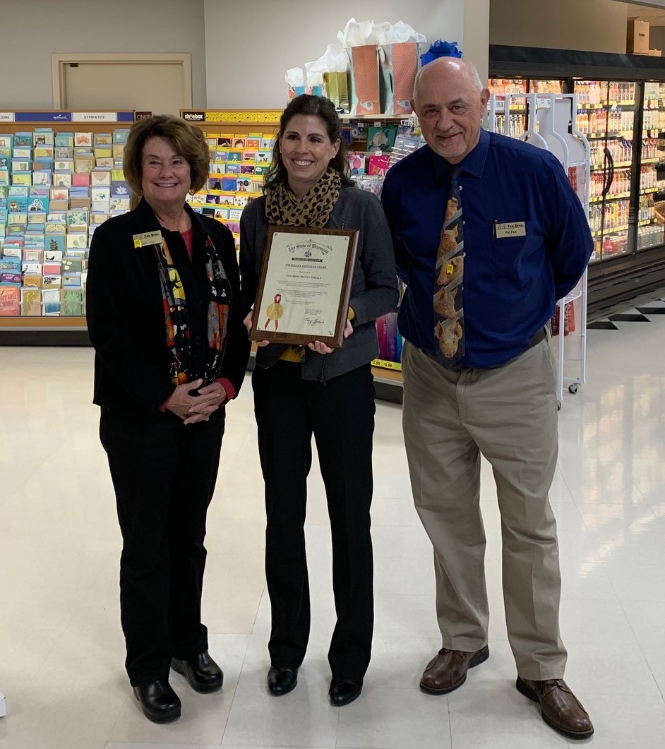 Pat and Lori Fox receiving The Exemplary Employer Award in recognition of National Disability Employment Awareness Month (NDEAM) and Fox Bros. Piggly Wiggly's commitment to the employment of individuals with disabilities